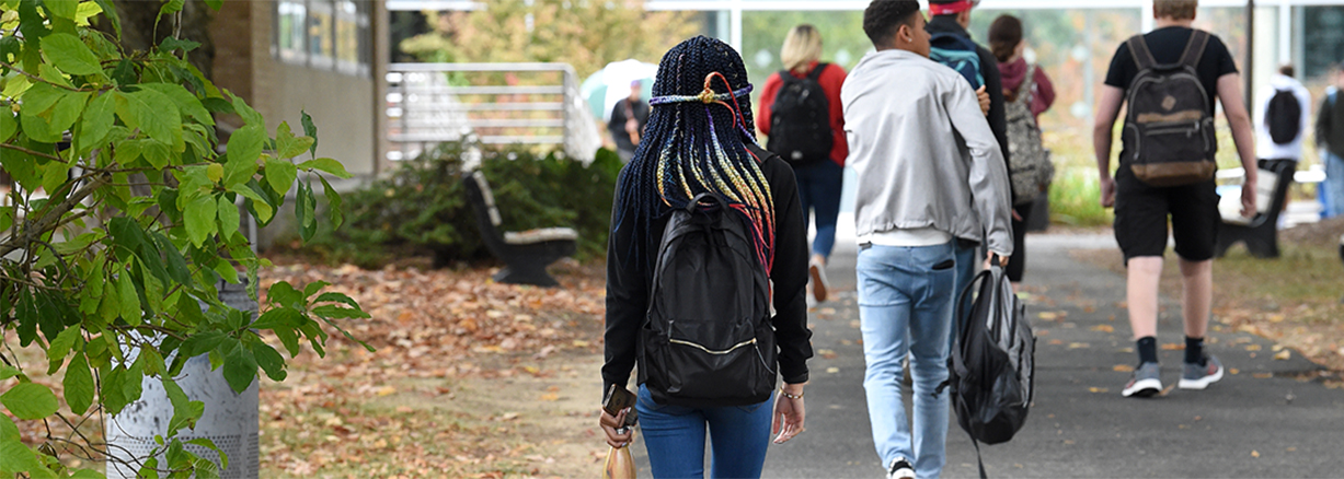 students walking on campus path