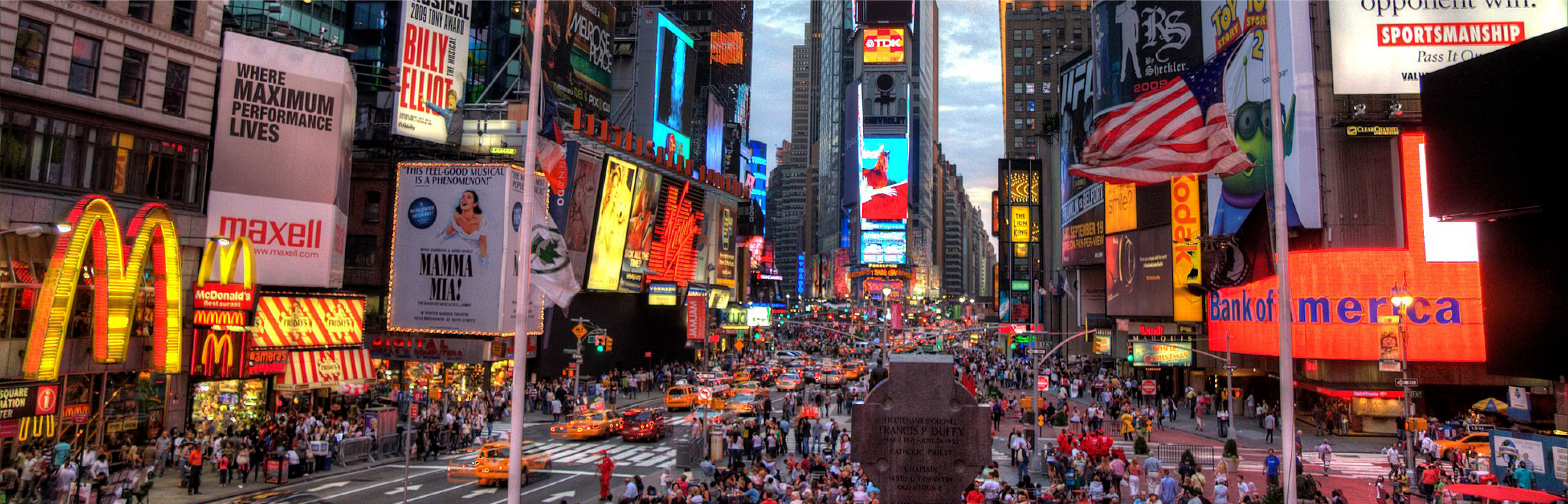 Travel has a trip planned for New York City, shown in the photo.